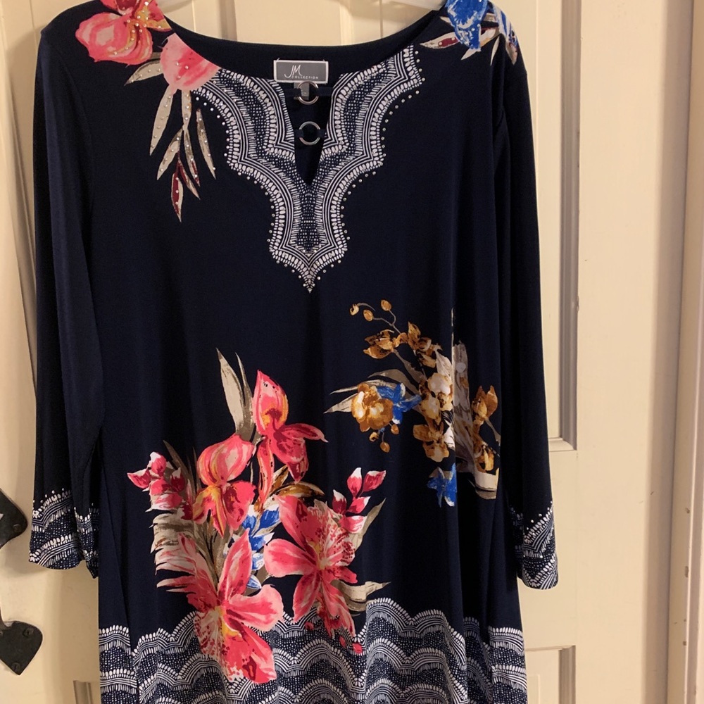 Beautiful floral top with sparkly accents.